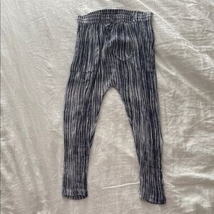 Free People Black and Gray Leggings with Sleek Design